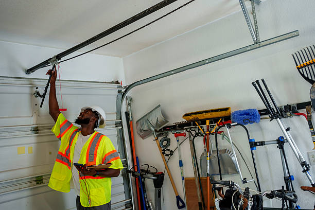Professional Garage Door Panel Replacement technician working in Fridley, MN